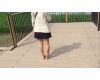 Japanese girl walks barefoot in the park